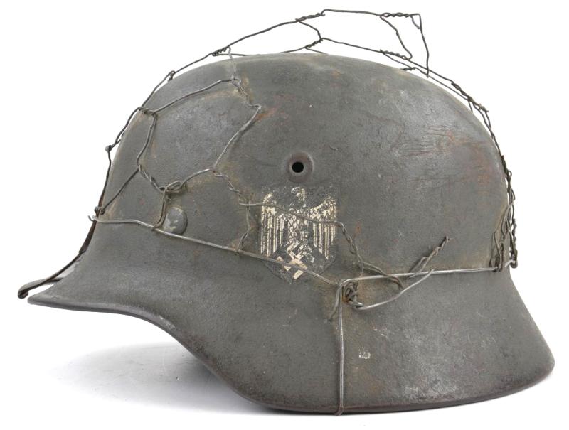 German WH M40 SD Combat Helmet with Battle damage and Half Wire Basket