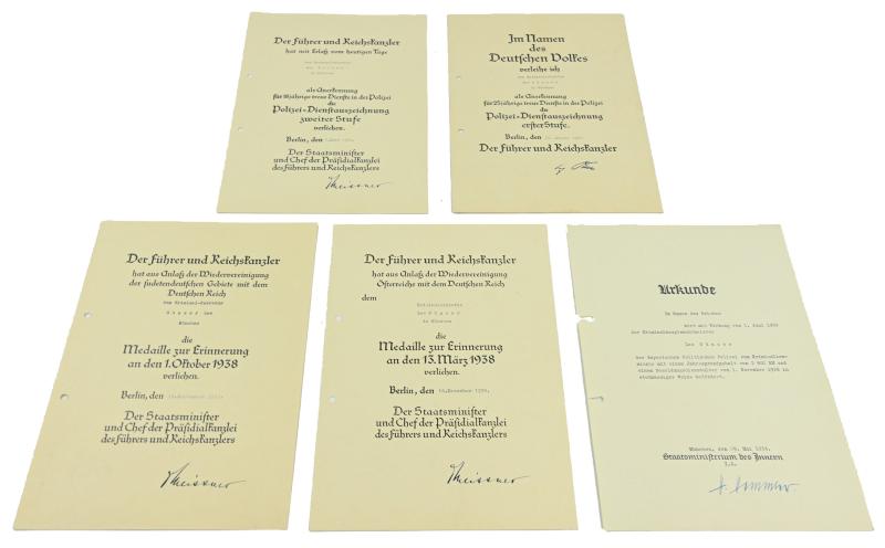 German Certificate Grouping 'SD-kriminalsekretär Leo Günzer' with Signature of Heinrich Himmler